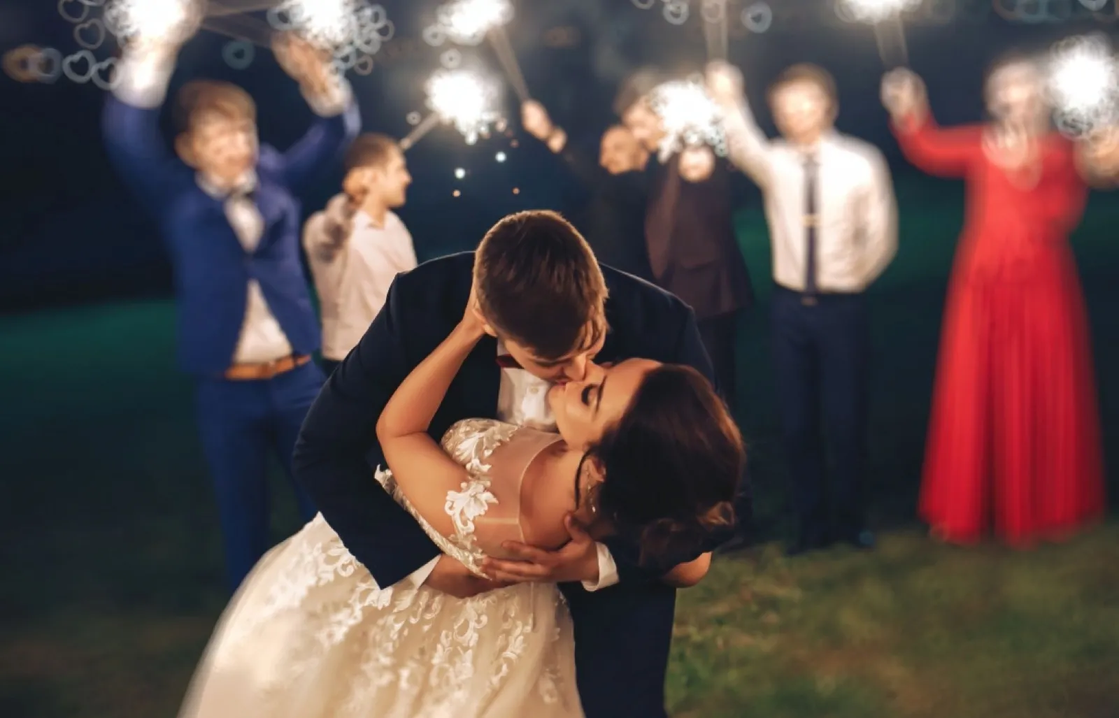 A couple kissing at their wedding at The Landing